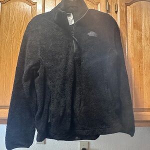 The Norh Face 1/4 zip with pockets fleece pullover.